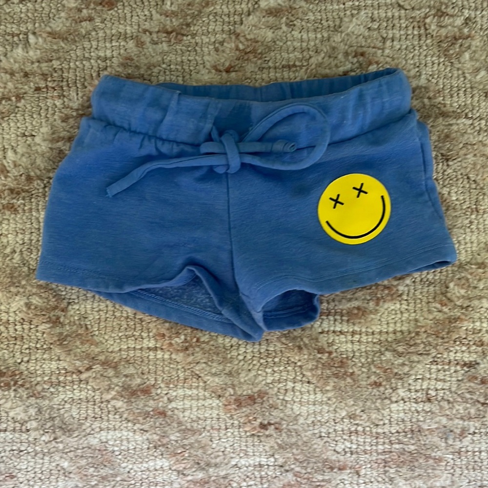 Revelation smiley face shorts